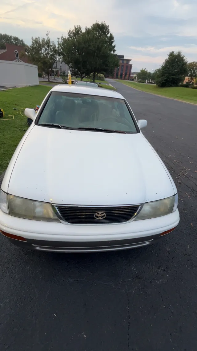 White Toyota Avalon, front view after exterior washing and waxing
